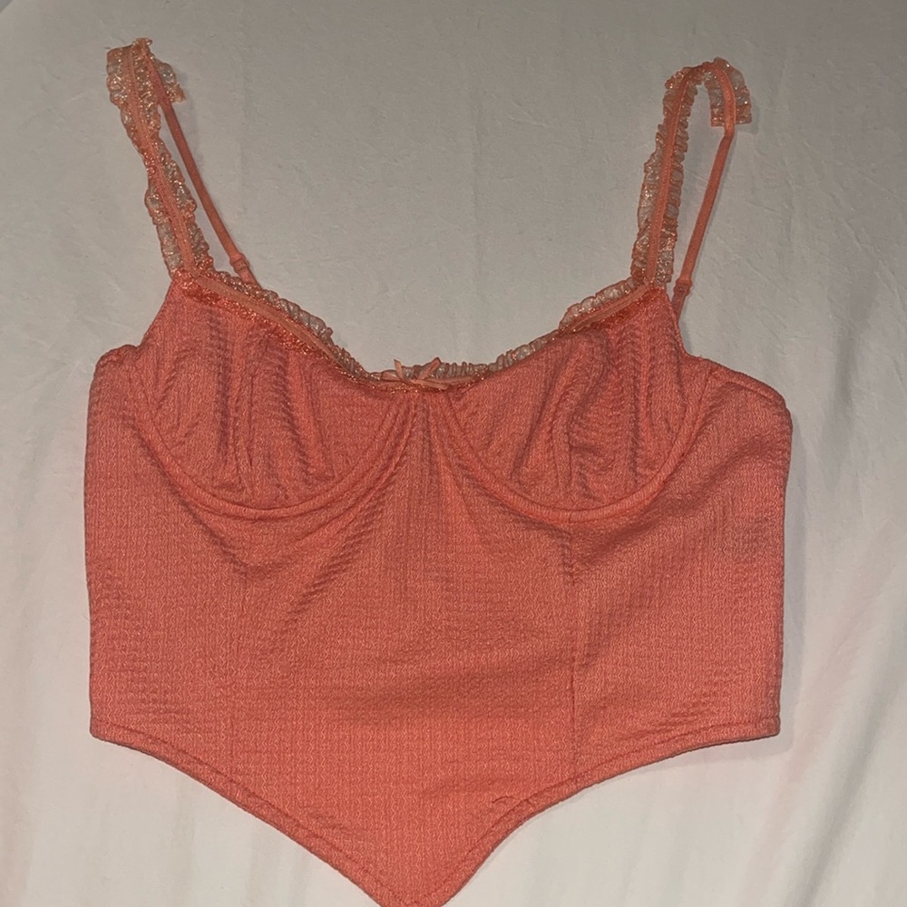Orange crop top corset.